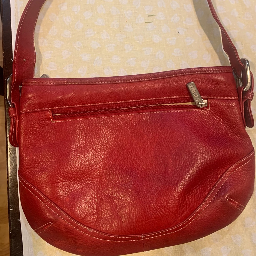 Piel red leather purse, 11 1/2” by 8”, made in Colombia